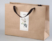 กระดาษคราฟท์รีไซเคิลเครื่องแต่งกายกระดาษแข็งถุงช้อปปิ้งสีน้ำตาล Takeaway Bag